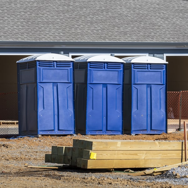what is the cost difference between standard and deluxe portable restroom rentals in Pink Hill
